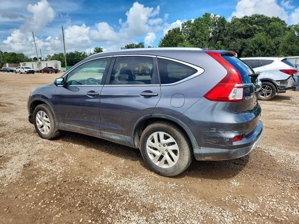 Photo 2 from auction – 2015 HONDA CR-V with VIN 2HKRM3H74FH528005