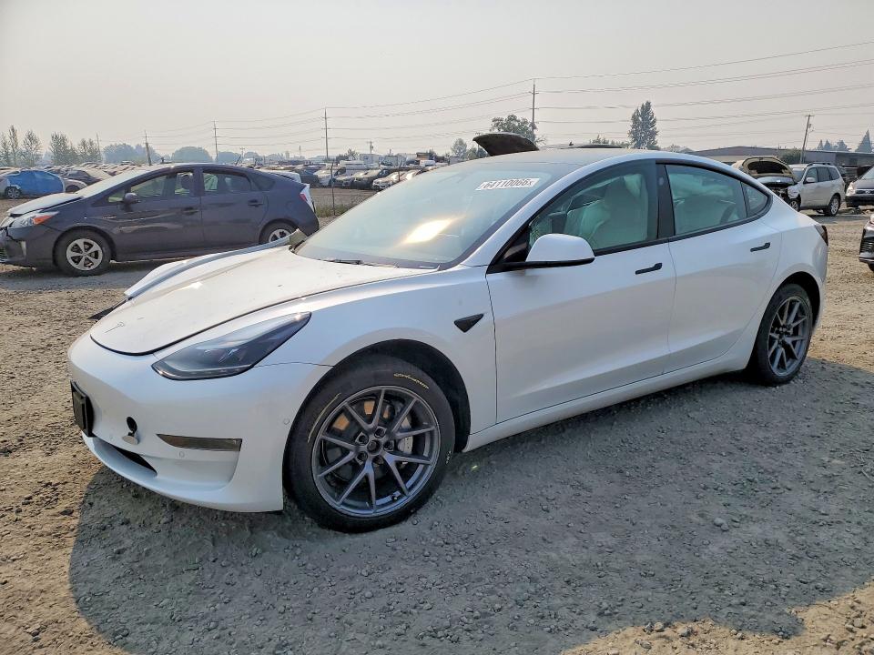 TESLA MODEL 3 2022 with VIN 5YJ3E1EB1NF343164 - Photo from auction