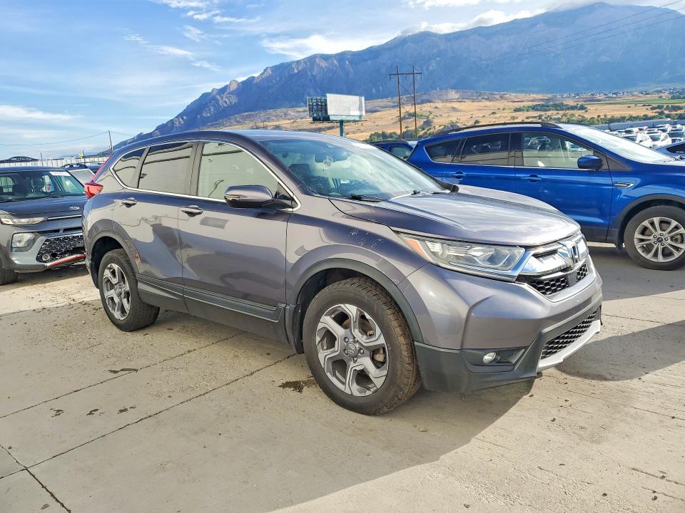 Photo 4 from auction – 2019 HONDA CR-V with VIN 7FARW2H80KE054676