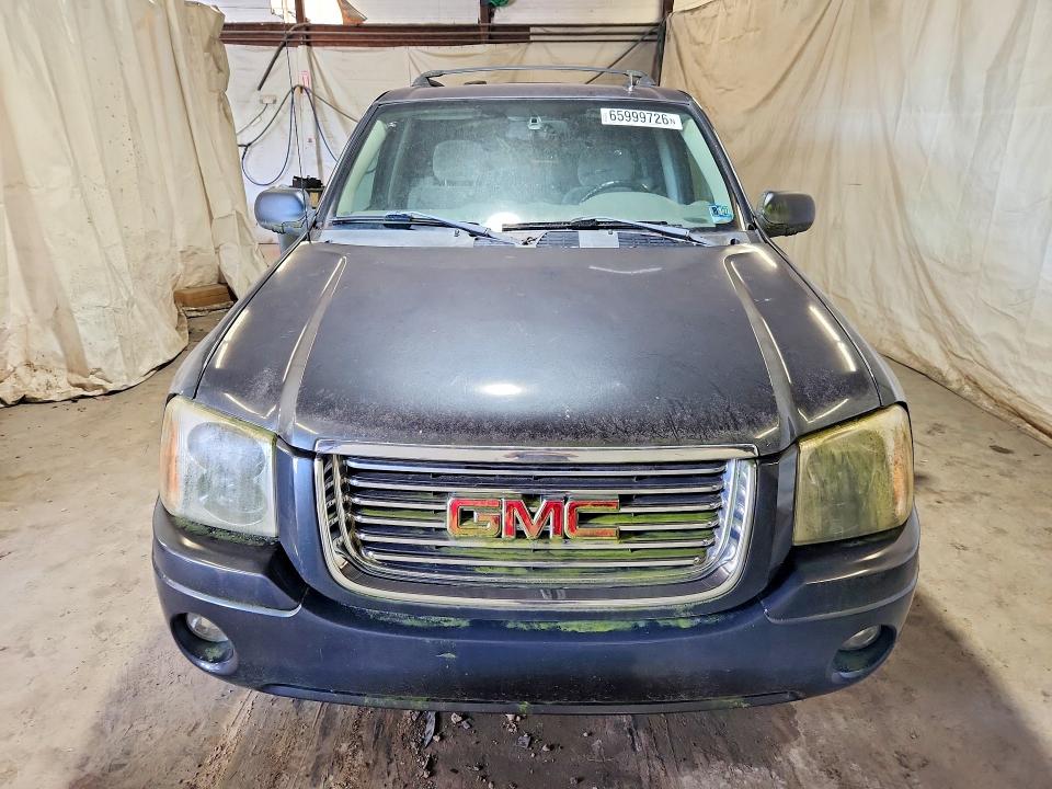 Photo 5 from auction – 2006 GMC ENVOY with VIN 1GKDT13S062318701