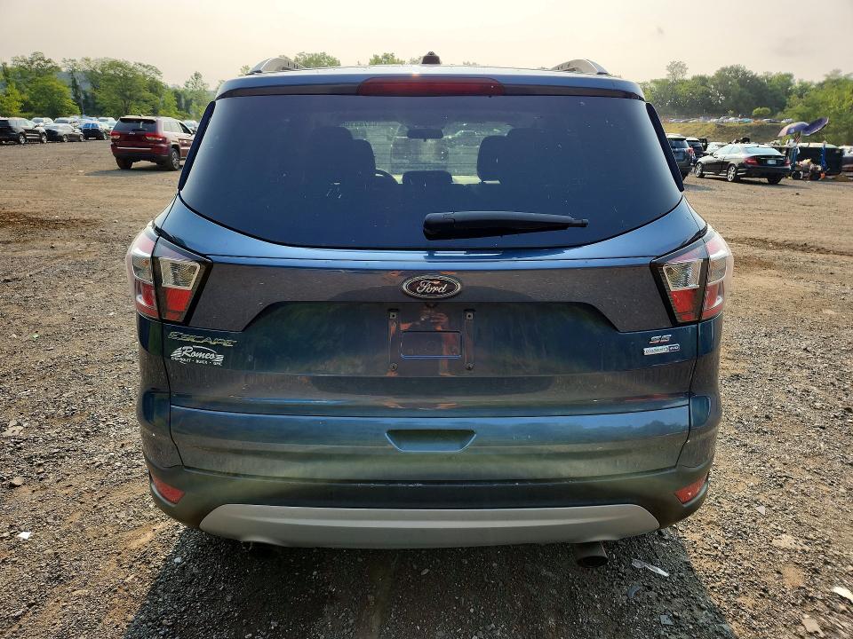 Photo 6 from auction – 2018 FORD ESCAPE with VIN 1FMCU9GD8JUC61719