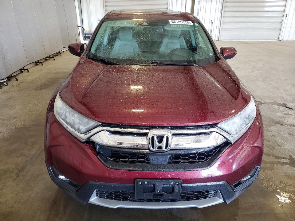 Photo 5 from auction – 2018 HONDA CR-V with VIN 7FARW2H81JE024424