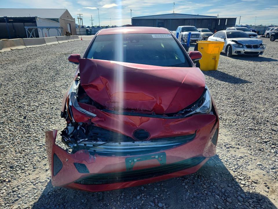 Photo 5 from auction – 2018 TOYOTA PRIUS with VIN JTDKARFU0J3547841