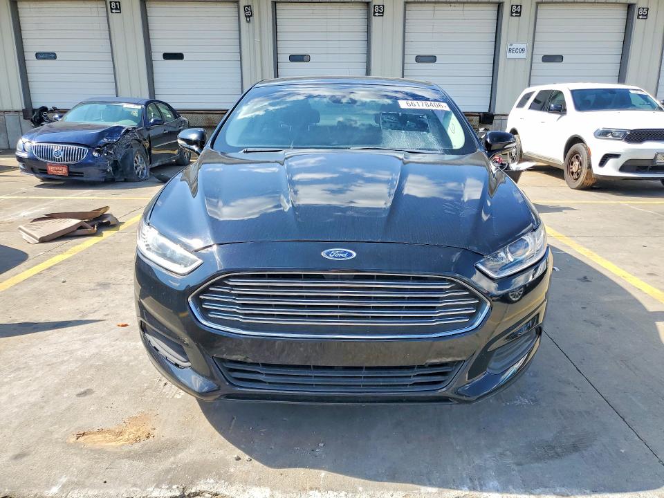 Photo 5 from auction – 2016 FORD FUSION with VIN 3FA6P0HD3GR308549