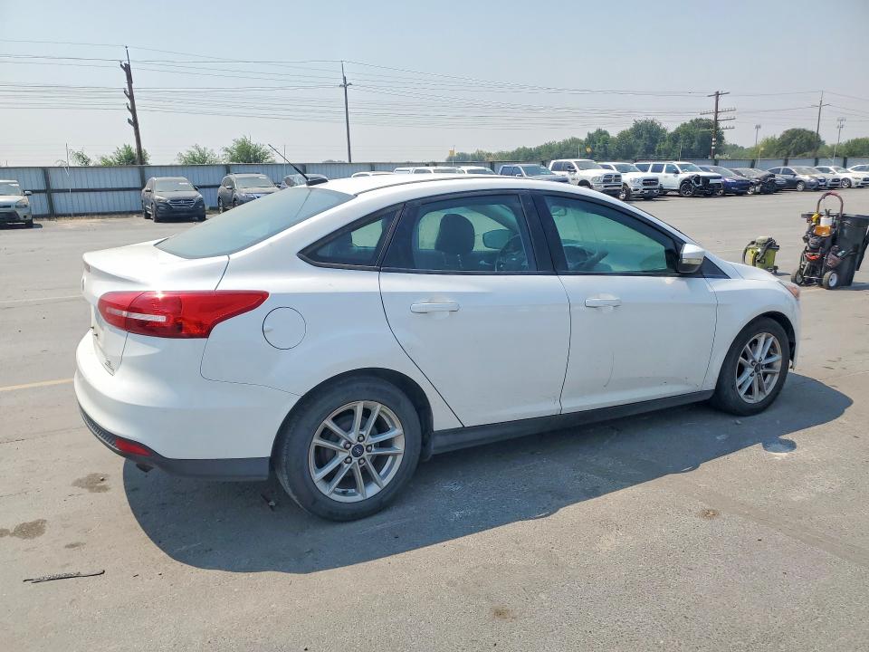 Photo 3 from auction – 2016 FORD FOCUS with VIN 1FADP3F22GL221136