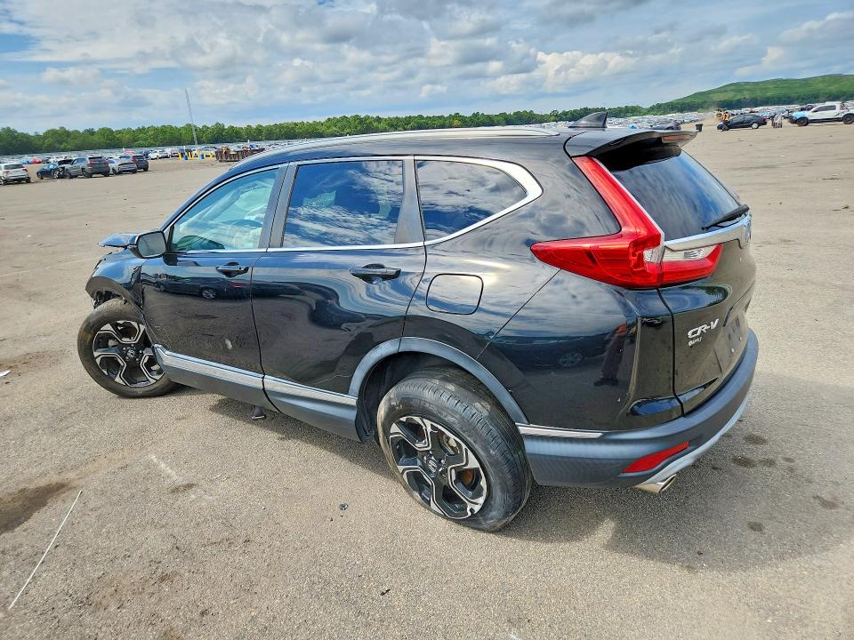 Photo 2 from auction – 2018 HONDA CR-V with VIN 7FARW2H94JE034941
