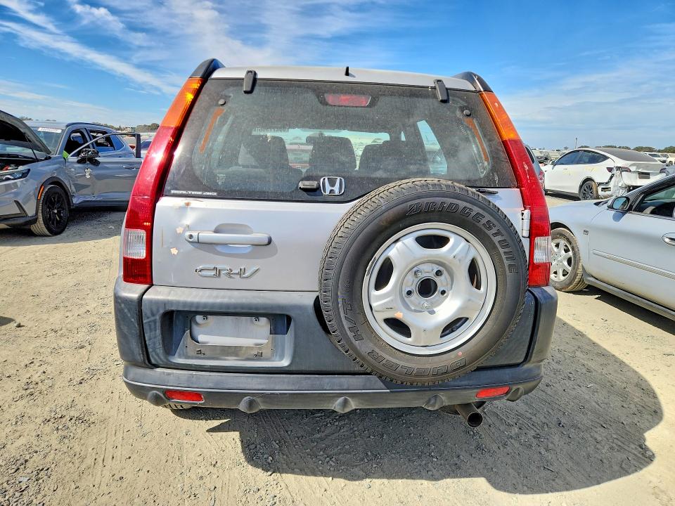Photo 6 from auction – 2002 HONDA CR-V with VIN JHLRD78462C076676
