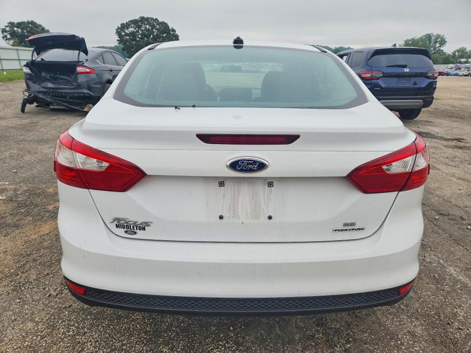Photo 6 from auction – 2014 FORD FOCUS with VIN 1FADP3F20EL411112