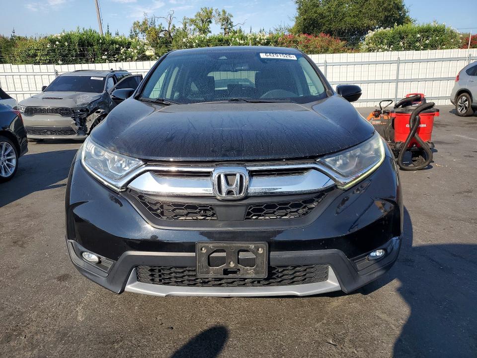 Photo 5 from auction – 2017 HONDA CR-V with VIN 7FARW1H89HE001977
