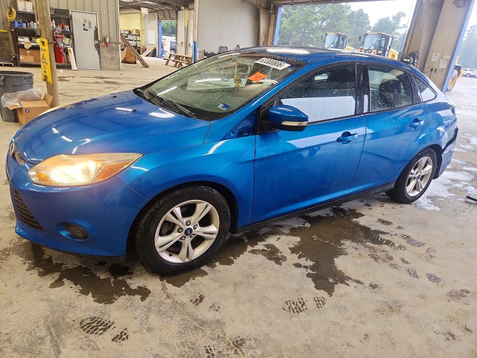 FORD FOCUS 2014 with VIN 1FADP3F21EL244596 - Photo from auction