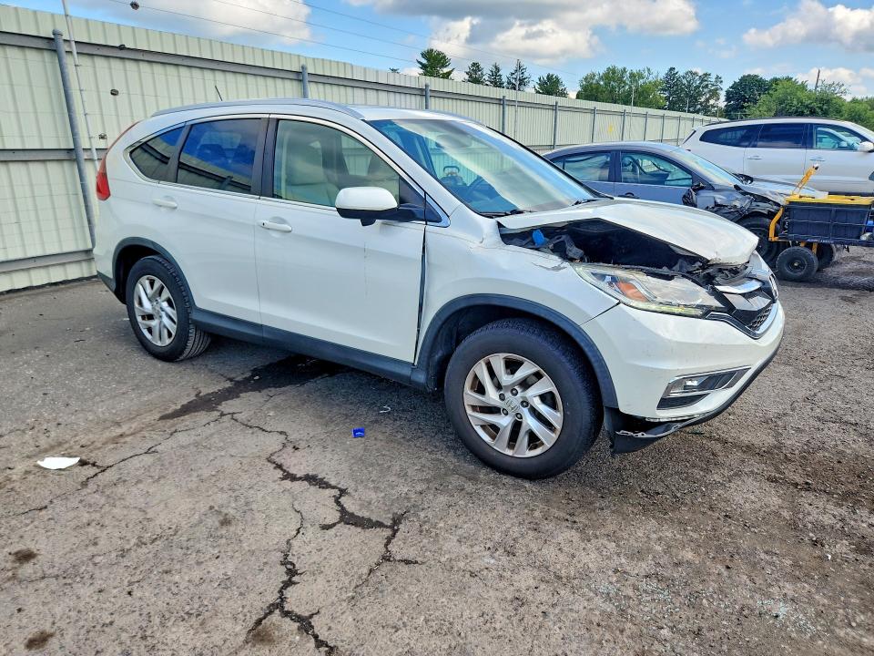 Photo 4 from auction – 2016 HONDA CR-V with VIN 5J6RM4H77GL049381