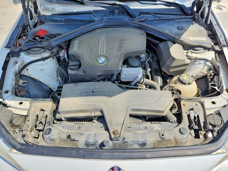 Photo 11 from auction – 2014 BMW 228 with VIN WBA1F5C54EV255846