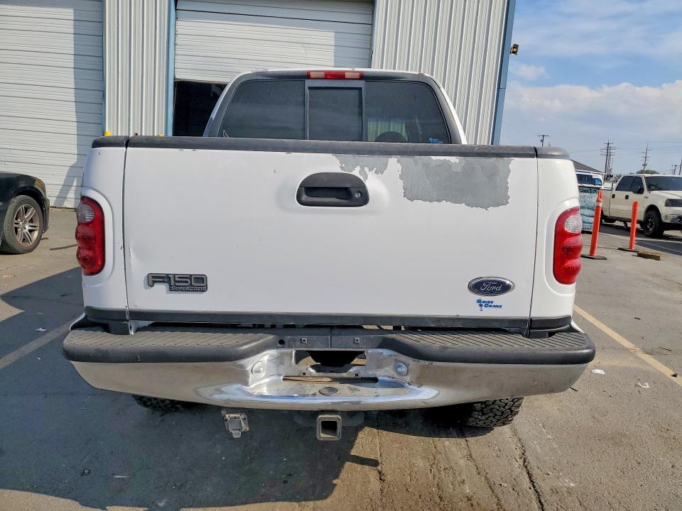 Photo 6 from auction – 2001 FORD F150 with VIN 1FTRW08W31KD71951