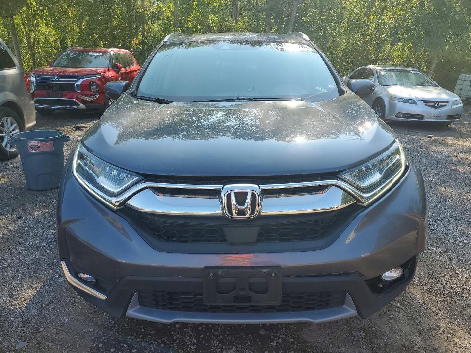 Photo 5 from auction – 2018 HONDA CR-V with VIN 2HKRW2H93JH119167