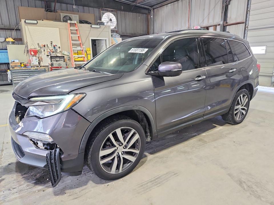 HONDA PILOT 2017 with VIN 5FNYF6H9XHB104435 - Photo from auction