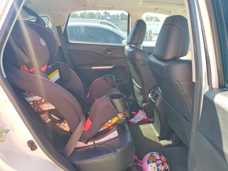 Photo 11 from auction – 2016 HONDA CR-V with VIN 5J6RM4H77GL080260