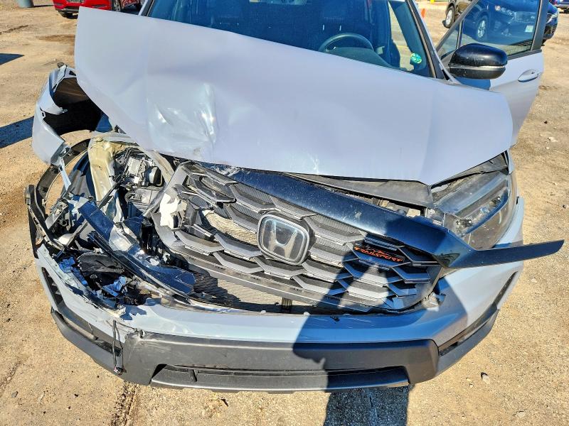 Photo 12 from auction – 2022 HONDA PASSPORT with VIN 5FNYF8H64NB002206