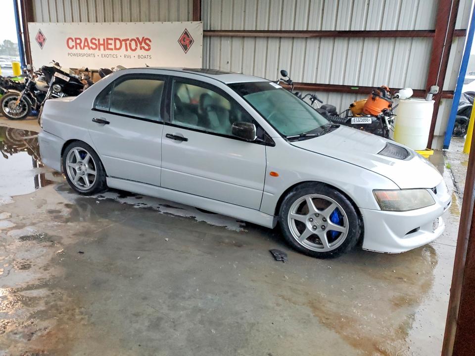 Photo 4 from auction – 2003 MITSUBISHI LANCER with VIN JA3AH86F23U124533