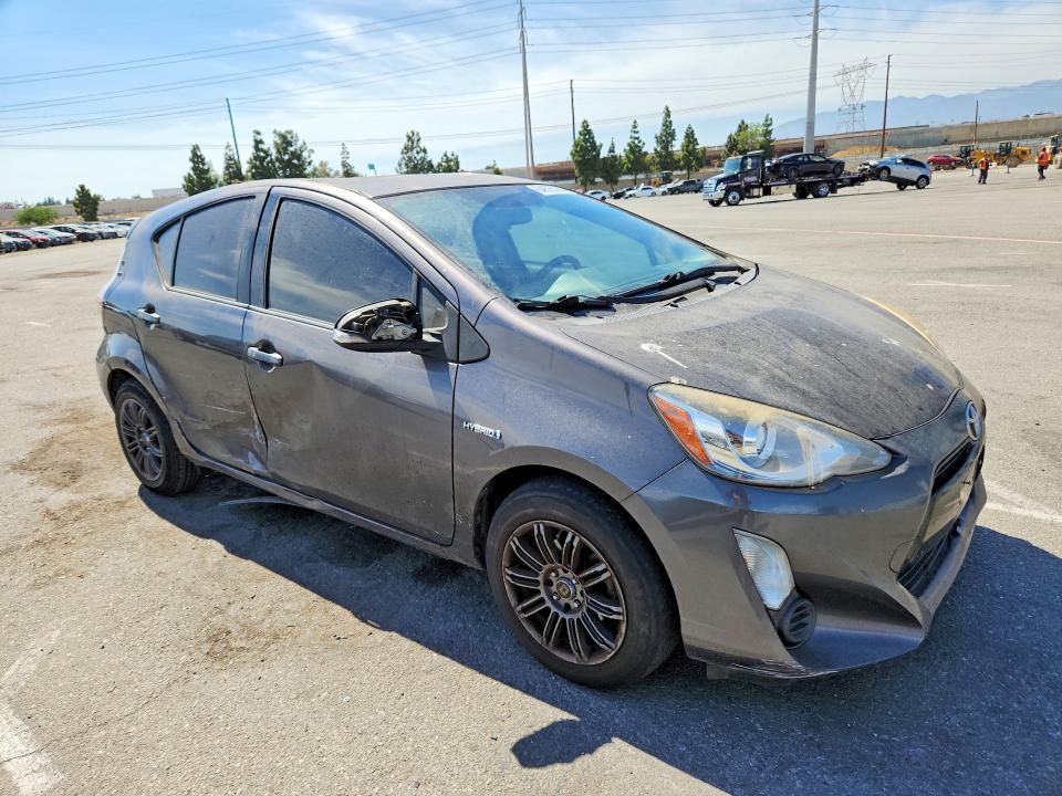Photo 4 from auction – 2015 TOYOTA PRIUS C with VIN JTDKDTB30F1090887