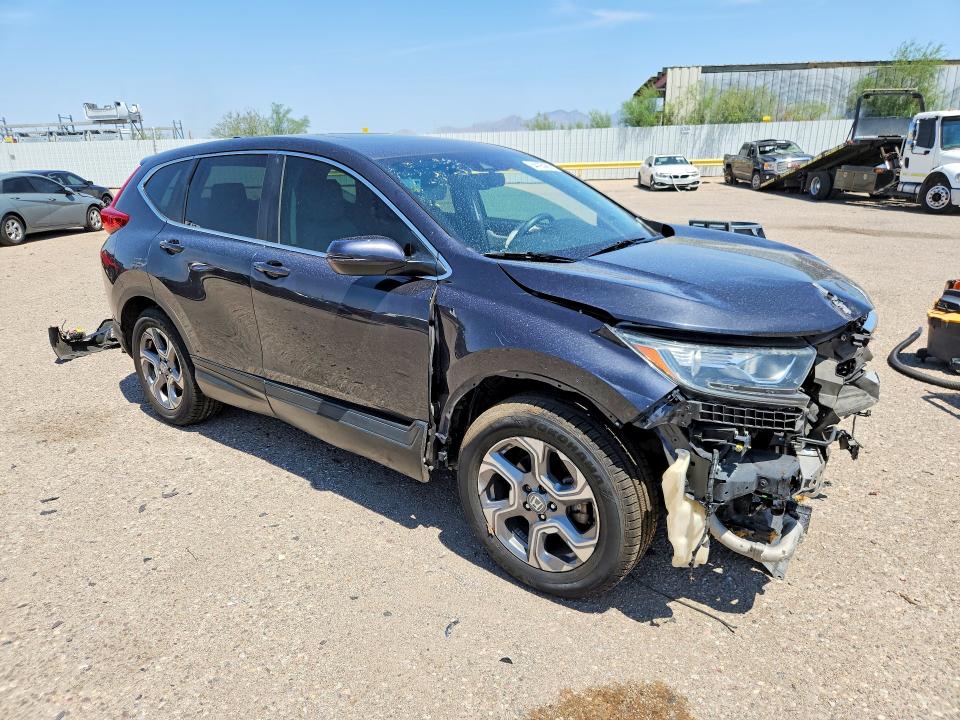 Photo 4 from auction – 2017 HONDA CR-V with VIN 2HKRW1H86HH509904