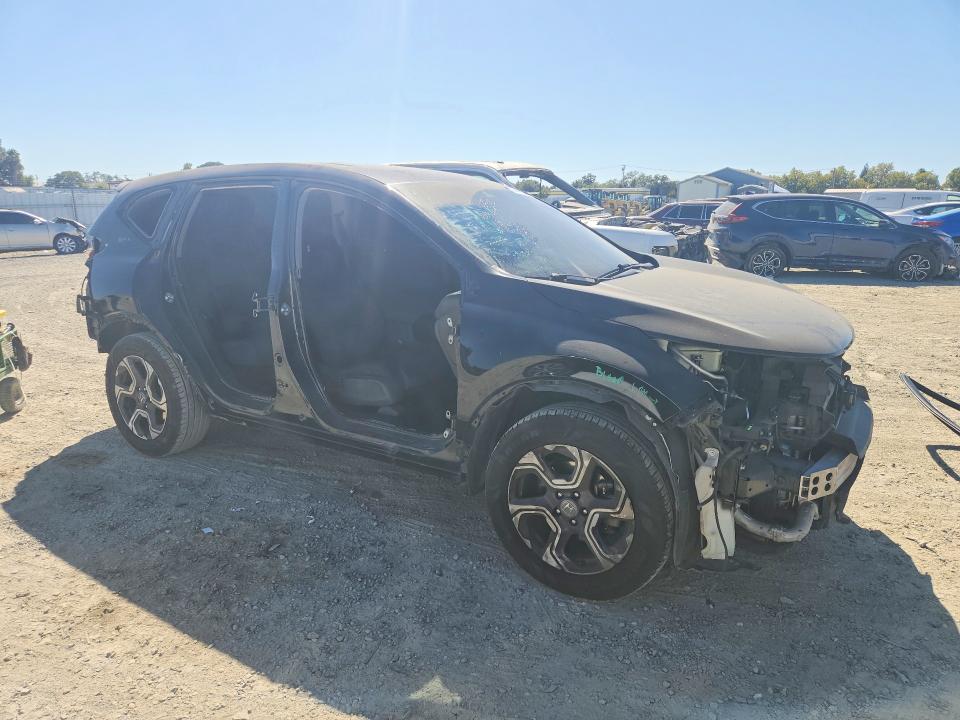 Photo 4 from auction – 2018 HONDA CR-V with VIN 7FARW1H57JE023973