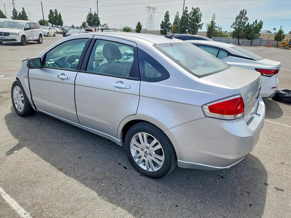 Photo 2 from auction – 2010 FORD FOCUS with VIN 1FAHP3HN1AW292262