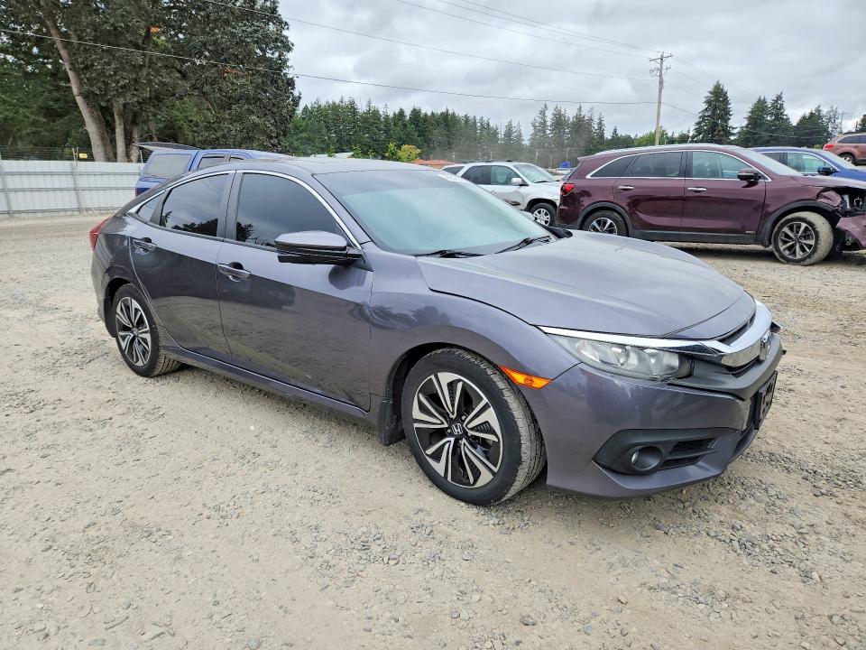 Photo 4 from auction – 2016 HONDA CIVIC with VIN 2HGFC1F31GH655025