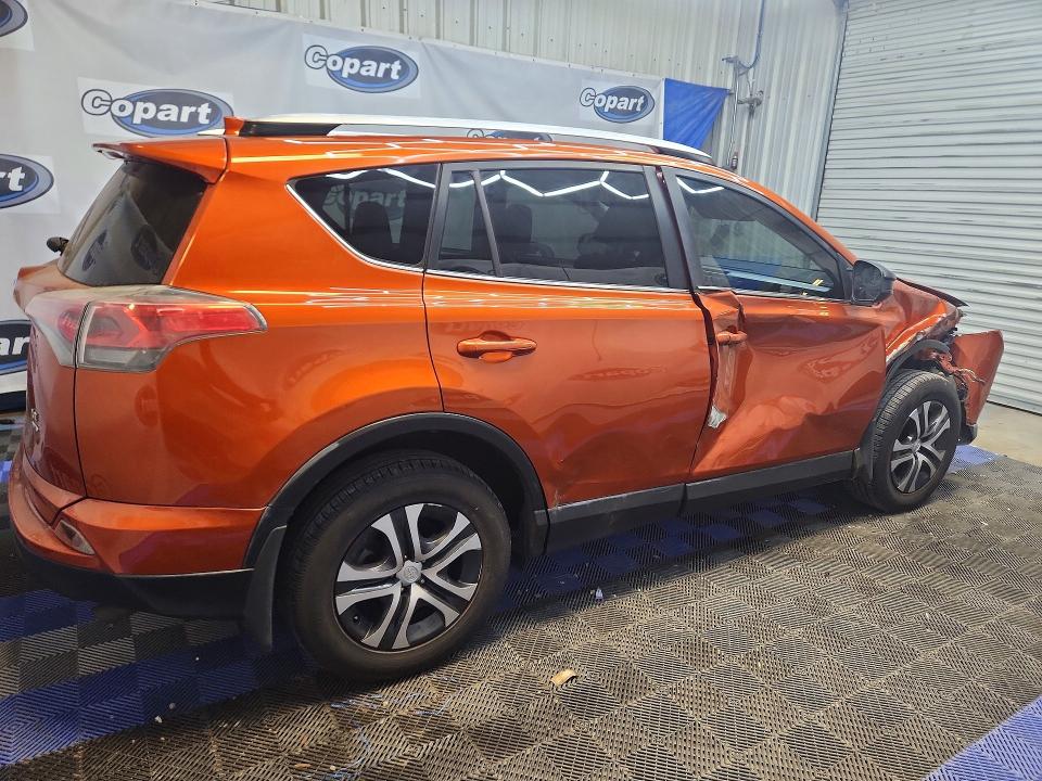 Photo 3 from auction – 2016 TOYOTA RAV4 with VIN JTMBFREV6GJ098391
