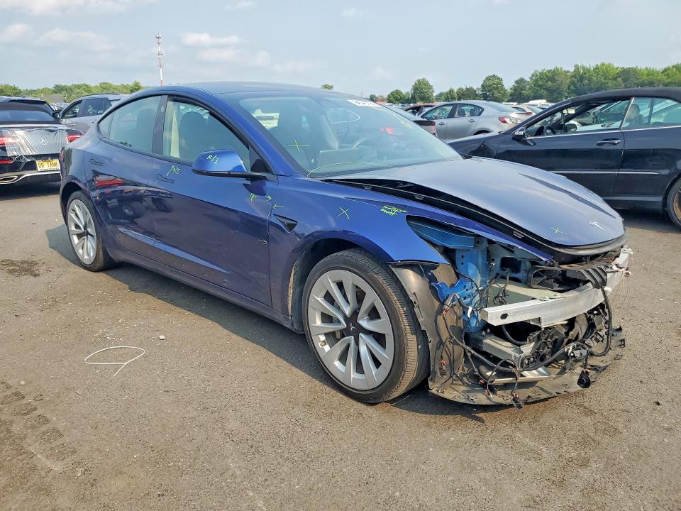 Photo 4 from auction – 2022 TESLA MODEL 3 with VIN 5YJ3E1EB1NF258633