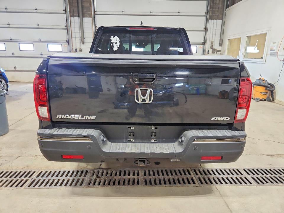 Photo 6 from auction – 2017 HONDA RIDGELINE with VIN 5FPYK3F80HB007238