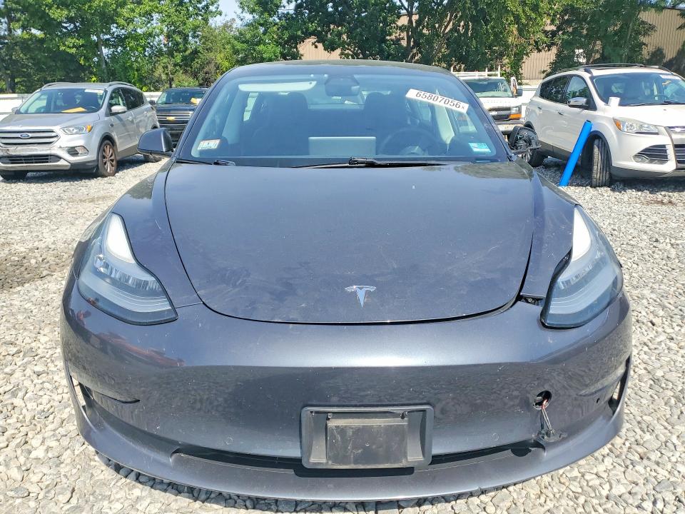 Photo 5 from auction – 2021 TESLA MODEL 3 with VIN 5YJ3E1EB9MF853227