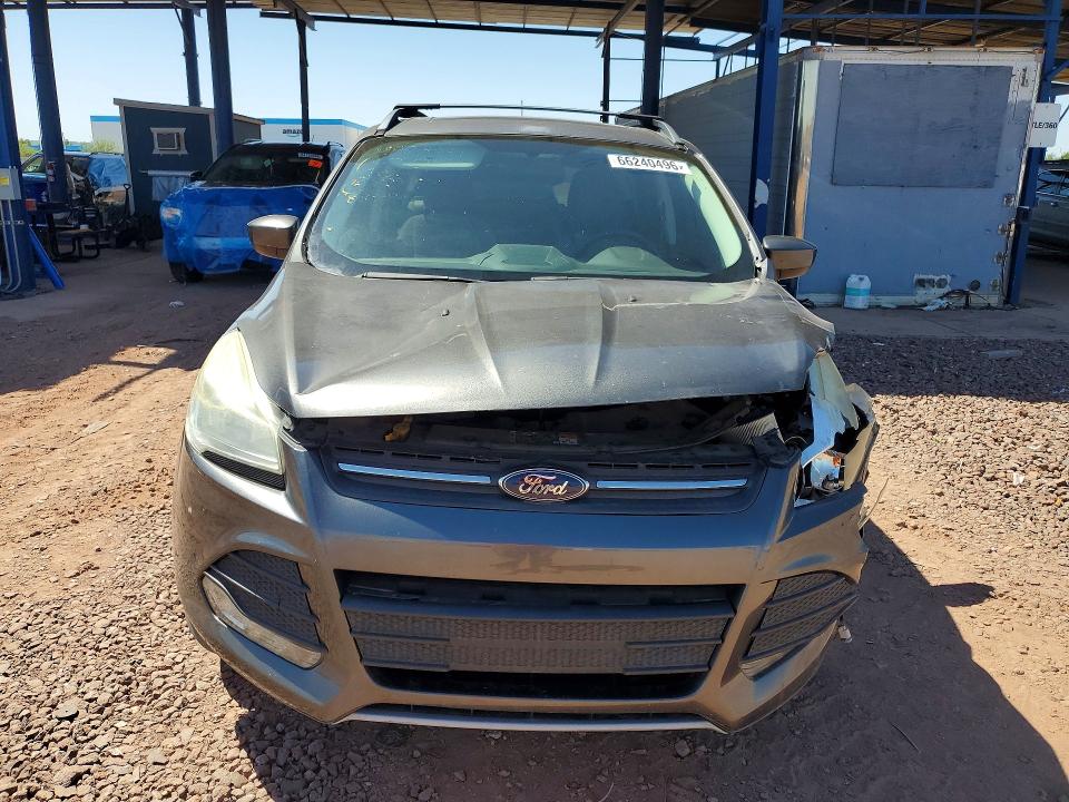 Photo 5 from auction – 2016 FORD ESCAPE with VIN 1FMCU0G95GUA68153