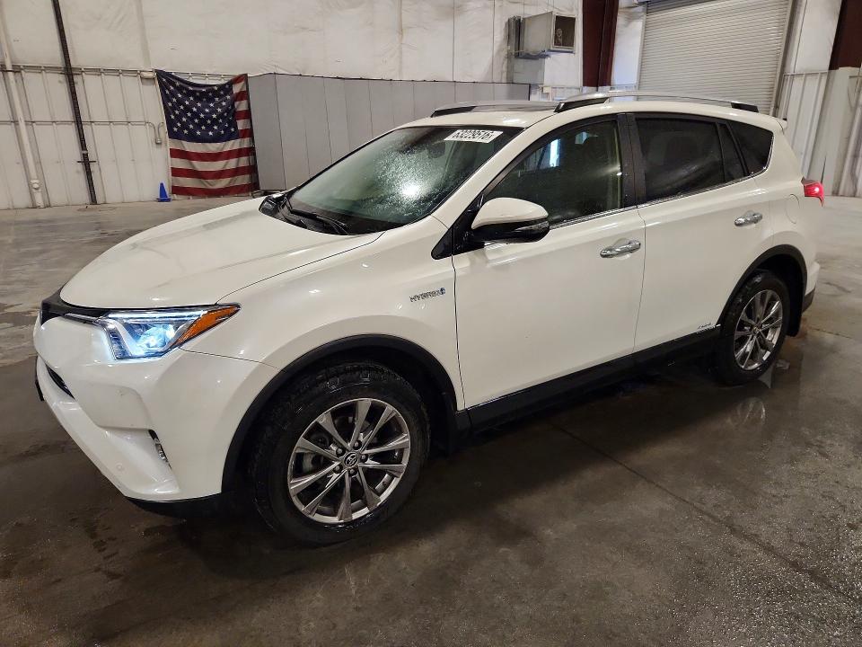TOYOTA RAV4 HV 2018 with VIN JTMDJREV6JD249274 - Photo from auction
