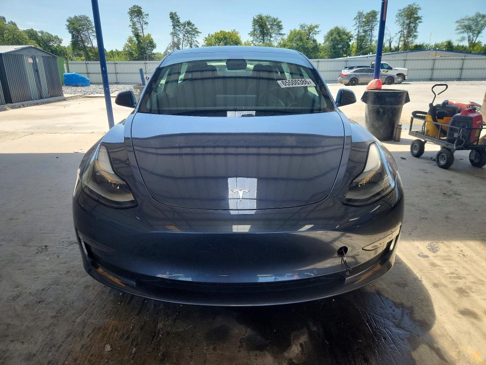 Photo 5 from auction – 2021 TESLA MODEL 3 with VIN 5YJ3E1EA6MF907266