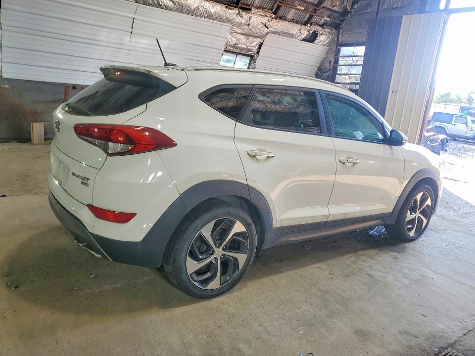 Photo 3 from auction – 2016 HYUNDAI TUCSON with VIN KM8J3CA29GU093175
