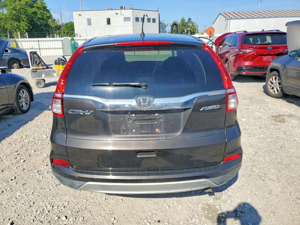 Photo 6 from auction – 2015 HONDA CR-V with VIN 2HKRM4H58FH625020