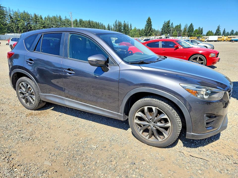 Photo 4 from auction – 2016 MAZDA CX-5 with VIN JM3KE4DY3G0717558