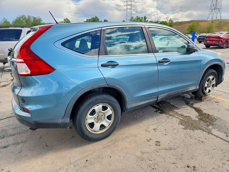 Photo 3 from auction – 2015 HONDA CR-V with VIN 5J6RM4H32FL083384
