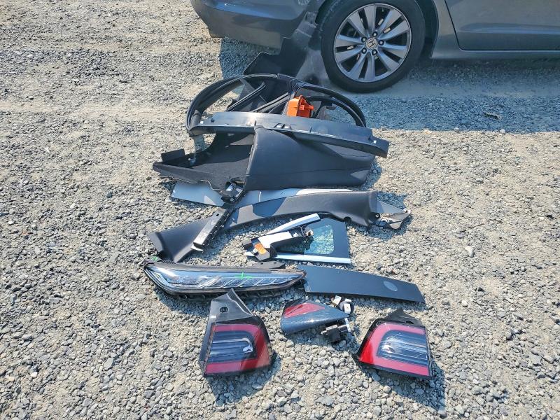 Photo 12 from auction – 2018 TESLA MODEL 3 with VIN 5YJ3E1EA1JF076013
