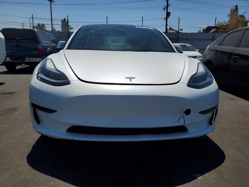 Photo 5 from auction – 2022 TESLA MODEL 3 with VIN 5YJ3E1EA5NF154573