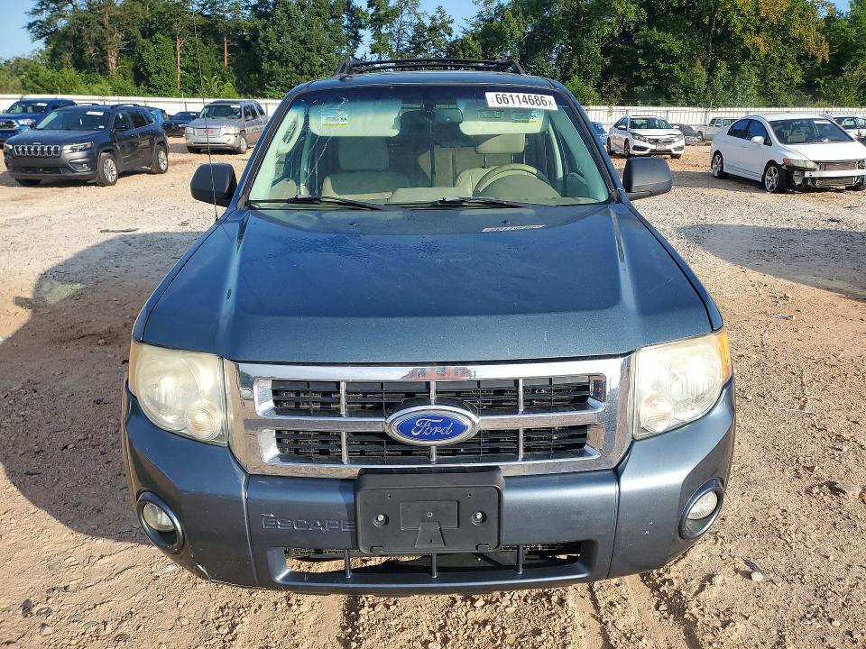 Photo 5 from auction – 2011 FORD ESCAPE with VIN 1FMCU0DG0BKC16409