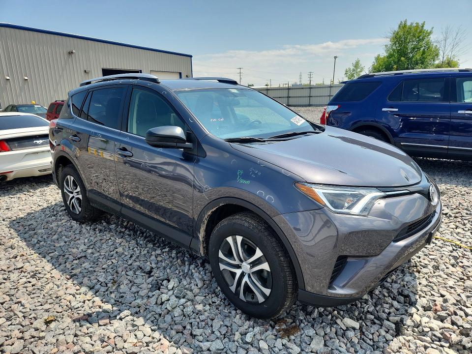 Photo 4 from auction – 2016 TOYOTA RAV4 with VIN JTMBFREV5GJ069917