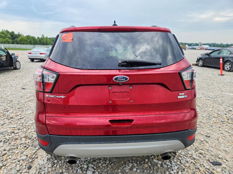 Photo 6 from auction – 2018 FORD ESCAPE with VIN 1FMCU9GD0JUC18671