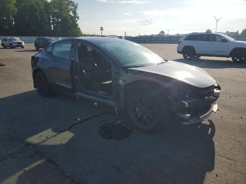 Photo 4 from auction – 2022 TESLA MODEL 3 with VIN 5YJ3E1EB8NF189732