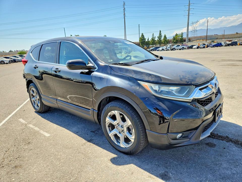 Photo 4 from auction – 2017 HONDA CR-V with VIN 7FARW1H89HE023851
