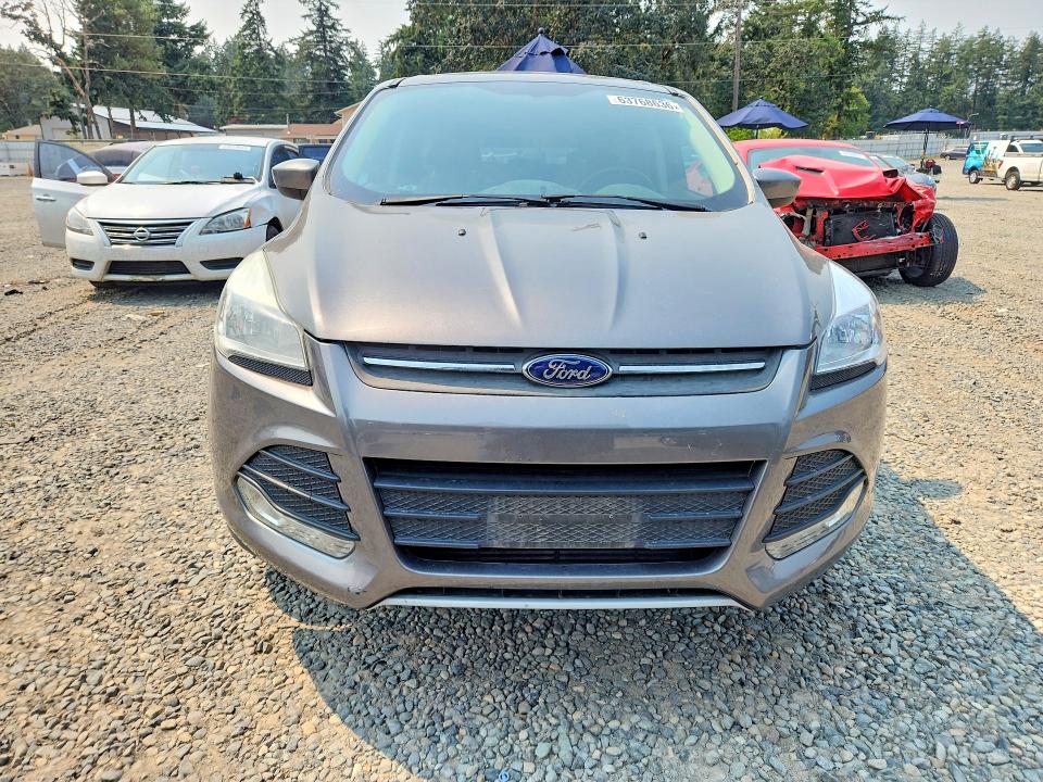 Photo 5 from auction – 2014 FORD ESCAPE with VIN 1FMCU9G94EUB32605