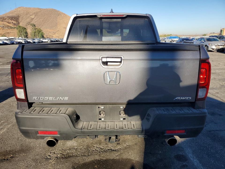 Photo 6 from auction – 2023 HONDA RIDGELINE with VIN 5FPYK3F56PB058246
