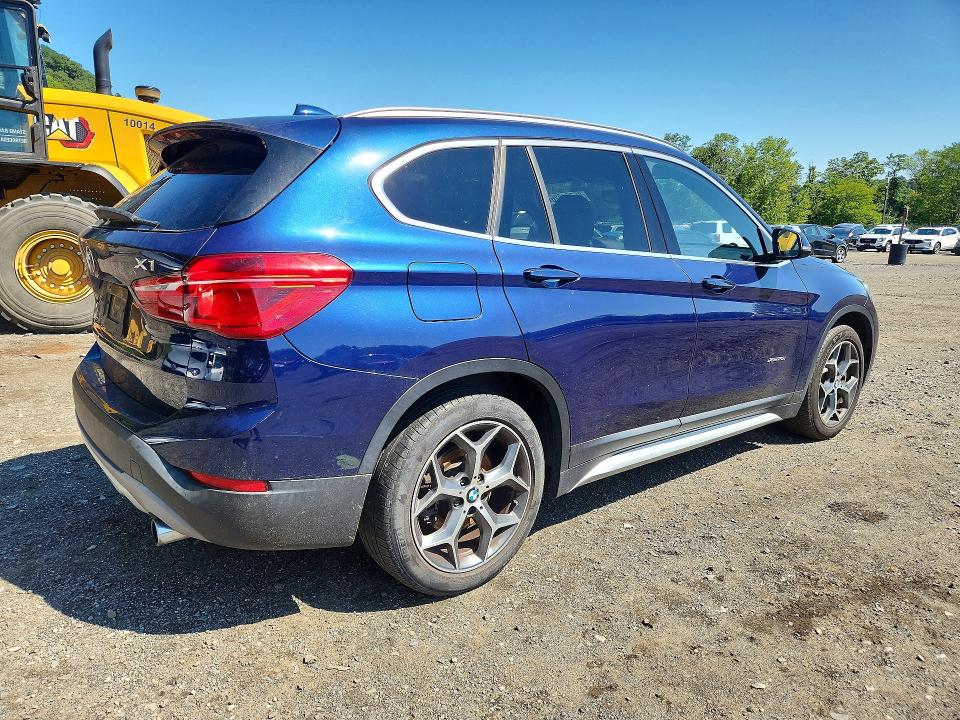 Photo 3 from auction – 2016 BMW X1 with VIN WBXHT3C30G5E48484