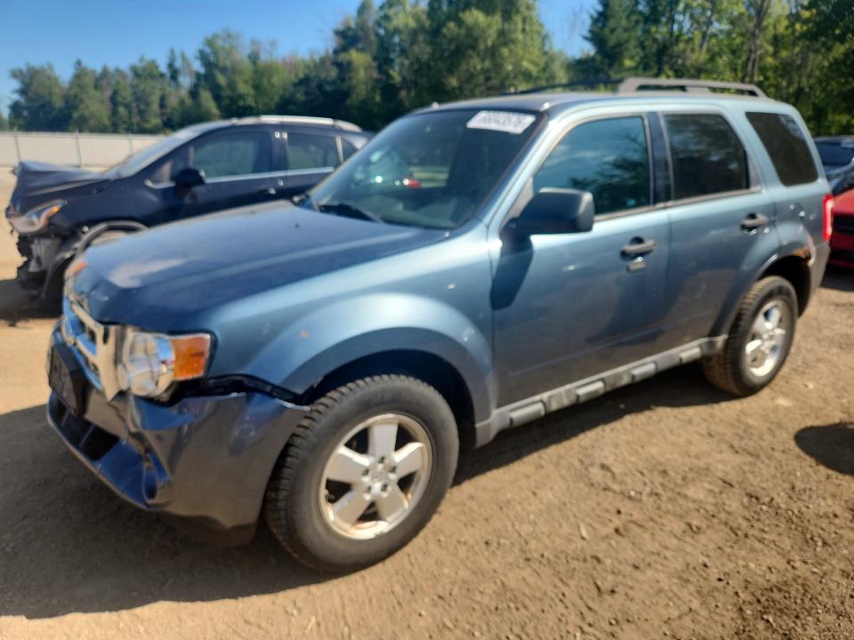 FORD ESCAPE 2011 with VIN 1FMCU0D72BKC33860 - Photo from auction