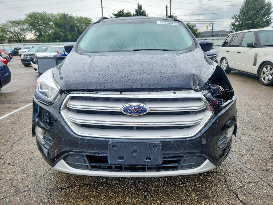 Photo 5 from auction – 2018 FORD ESCAPE with VIN 1FMCU9HD5JUB51080